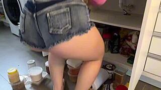Housewife in Micro Jean Shorts