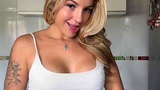 Young Blonde Shakes Her Big Ass, Showing Pierced Nipples in Solo Display