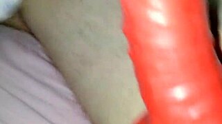 Wearing latex suit with sheath, husband and amateurs in costumes.