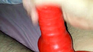 Wearing latex suit with sheath, husband and amateurs in costumes.