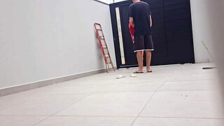 Redhead wife sunbathes in bikini while neighbor fixes gate