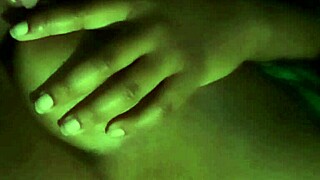 She licks her nipples at night, feeling so good