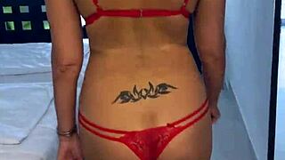 Lisa's daring balcony flash in lingerie, showcasing her tattoo.