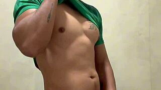 mexican footballer jerks off in the gym bathroom