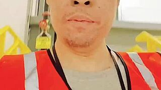 Asian mature woman walking about during work in public.