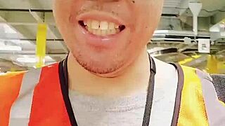 Asian mature woman walking about during work in public.