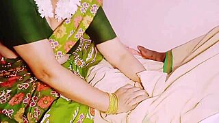 In the bedroom, the Indian maid with big boobs in saree gets dirty talking while fucking the house owner.