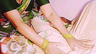 In the bedroom, the Indian maid with big boobs in saree gets dirty talking while fucking the house owner.