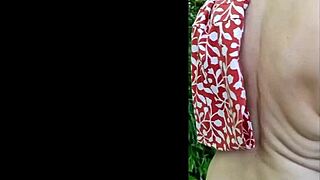 this naughty housewife is naked and wanking in the forest, reaching orgasm outdoors.