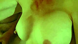 Cougar Wife Giving Handjob While Playing with Tits