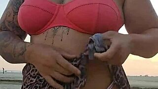 african milf flashes big ass on beach looking for virgin