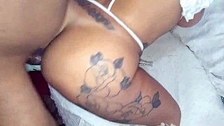 intimate sofa encounter with a dark-skinned partner