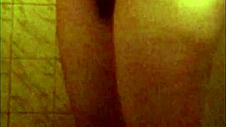 Spying on perfect ass ebony babe in shower, hidden cam catches her naked