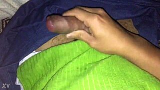 Feeling the intense pleasure during young man's masturbation.