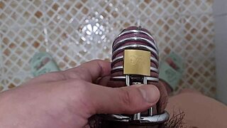 Young Asian Pees With Chastity Belt On Cock