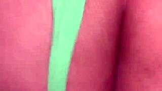 Mature amateur wears thong in casual setting