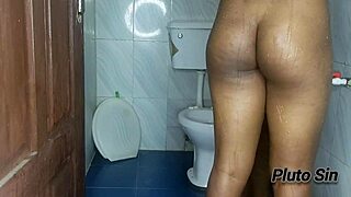 Ebony teen gives blowjob in wet bathroom, but can she handle the big cock?