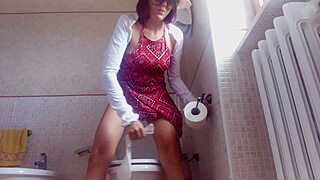 Swearing while topless in the hidden toilet, showing off big tits and ass