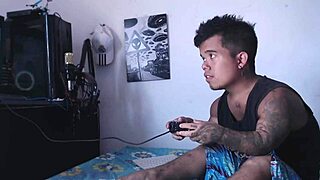 While he was playin video games, the horny stepsister came to play with his dick