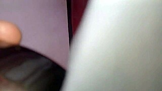 Watch the guy in feminine clothing fuck the busty Latina brunette's pear-shaped ass, burying his cock deep in her anus.
