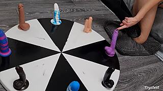Wheel of dildos she wants to win her orgasm here