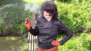 milf smokes in leather outdoors