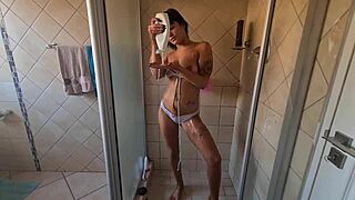 soaping up my body in the shower, feeling sexy and wet