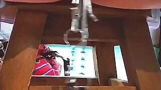 Big pink pussy lips dangled and stretched down with weights.