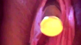 Big pink pussy lips dangled and stretched down with weights.