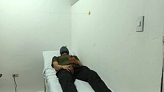 Kinky doctor masturbates his cock in the office.