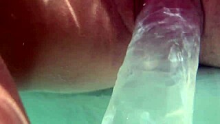 underwater adventure with creampie and dildo in shaved pussy