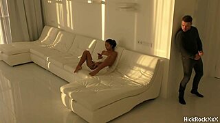 black asian teen exploring in white room