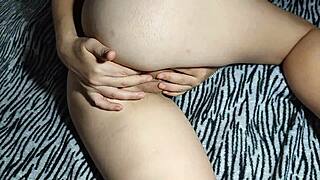 Without taking off her panties, the Korean woman rubs her fingers on the Asian pie?