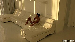 black asian teen exploring in white room
