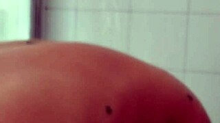 Big dick male shaving his penis in bathroom