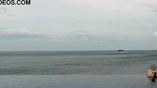 relaxing by the infinity pool