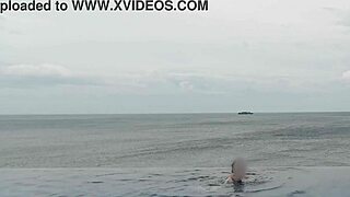 relaxing by the infinity pool