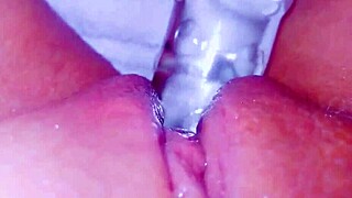Curious coed squirts on glass toy 😮💦