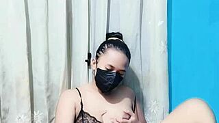 Bikini-clad housewife teases pussy with dildo in solo play