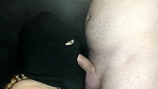 My step sister's hot mouth sucks the cock while her face is hidden by a balaclava