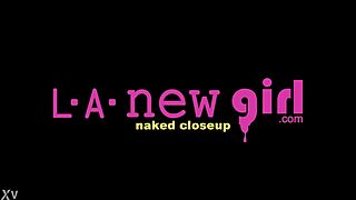 red haired model reveals her body in photoshoot