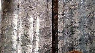 on the balcony watching the attractive neighbor girl