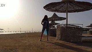 I go without panties on a public beach, flashing my big tits