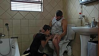 Petite performing oral on toilet