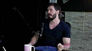 Arthur Aily in sheer red lingerie, exploring pain and inversion during group play