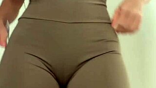 wife trying clothes in dressing room