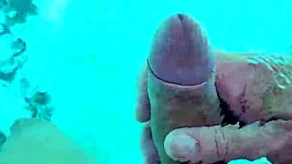 i jerk off naked in the pool, feeling the water around me