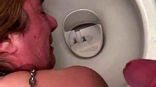 Slave endures public urinal humiliation