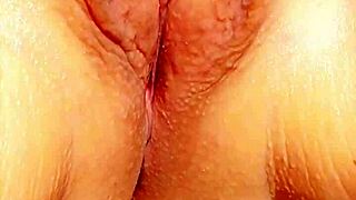 Mature woman exposes big wet vulva outdoors