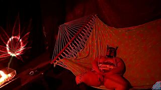 getting frisky in a tent fingering her wet hole in a hammock!!